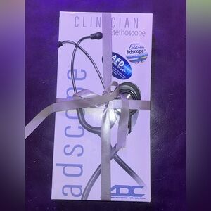 brand new stethoscope, in original packaging. cheetah print pattern